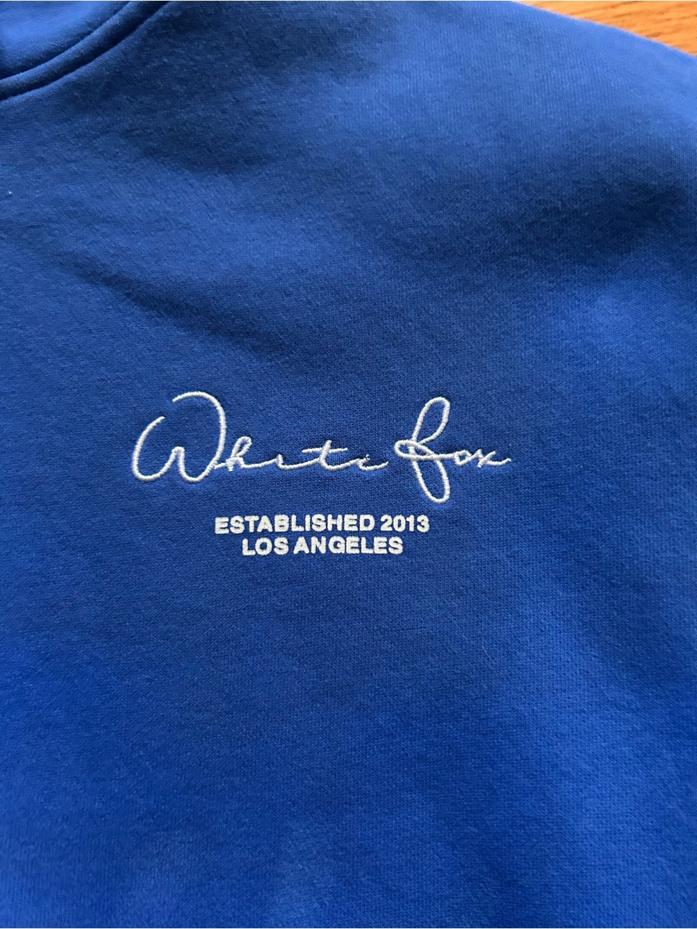 White Fox Boutique Blue Crewneck Sweatshirt with White Script Logo